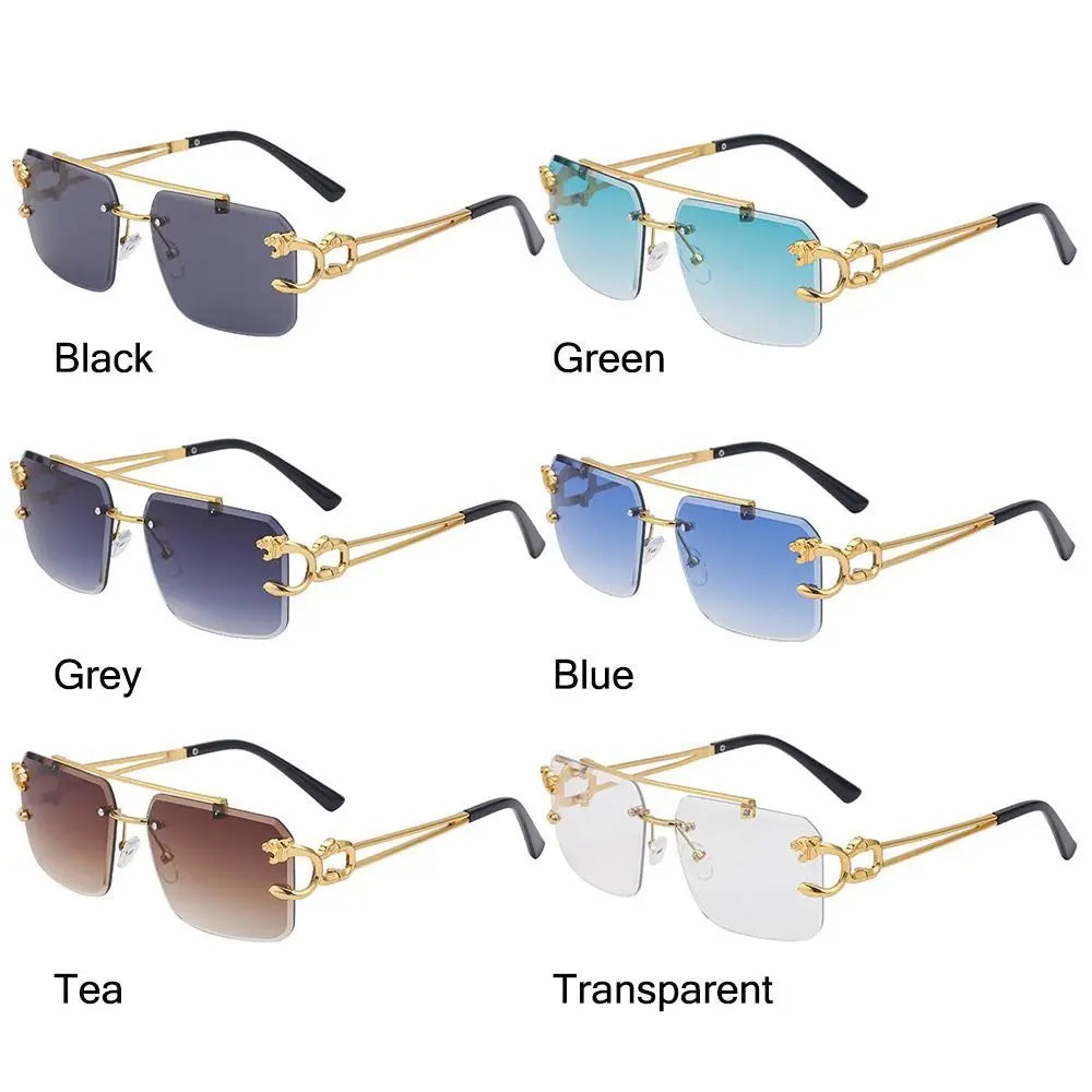 Collection of gold-framed sunglasses with different colored lenses on a white background.
