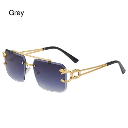 Gold-framed sunglasses with gradient lenses on a white background